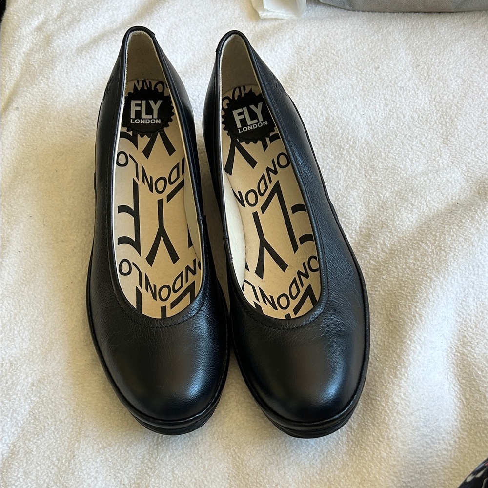 Fly London Women's Classic Black Walking Wedges